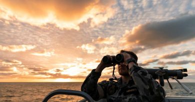 Officer of the watch Sub-Lieutenant Lucas Menenti looks out from HMAS Brisbane’s bridge wing during an air-warfare serial off the coast of Queensland on Exercise Talisman Sabre. Story by Lieutenant Sarah Rohwede. Photo by Leading Seaman Daniel Goodman.