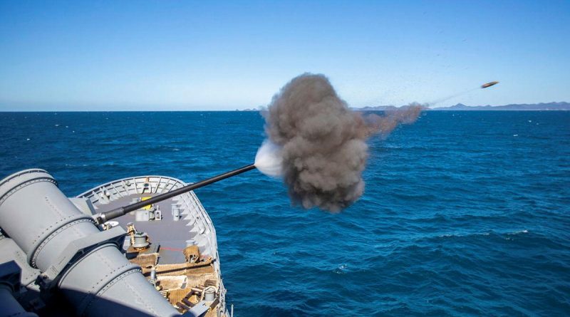 HMAS Ballarat conducts a five-inch gun firing while sailing off the coast of Queensland during Exercise Talisman Sabre. Story by Lieutenant Commander Ryan Zerbe. Photo by Leading Seaman Ernesto Sanchez.