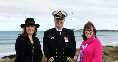 Commanding Officer Navy Headquarters – South Australia Commander Alastair Cooper with the granddaughters of Thomas Todd, Debra Filippona, left, and Michelle Bitmead at the memorial service. Story by Leading Seaman Jonathan Rendell.