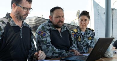 HMAS Parramatta's boarding party officer Lieutenant Daniel McMillan, left, Chief Petty Officer John Hogan and Commanding Officer Commander Anita Nemarich meet virtually with personnel from the Royal Brunei Navy. Story and photo by Leading Seaman Jarrod Mulvihill.