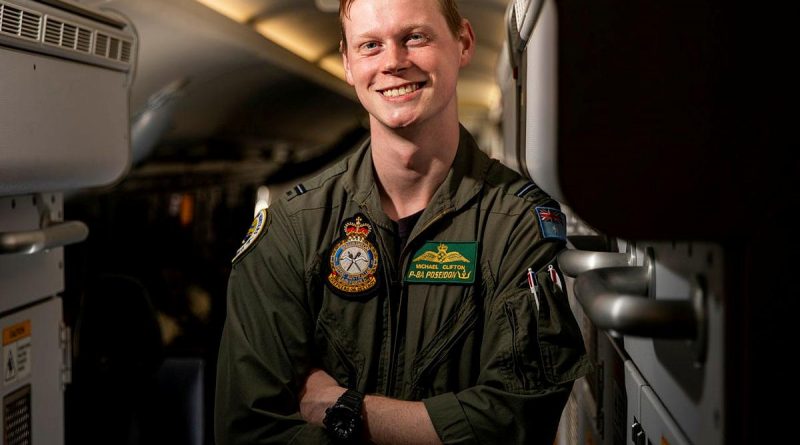 Flying Officer Michael Clifton, a maritime patrol and response officer from No. 11 Squadron, on board a P-8A Poseidon aircraft at RAAF Base Townsville during Exercise Talisman Sabre 2021. Story by Flight Lieutenant Chloe Stevenson. Photo by Leading Aircraftwoman Emma Schwenke,