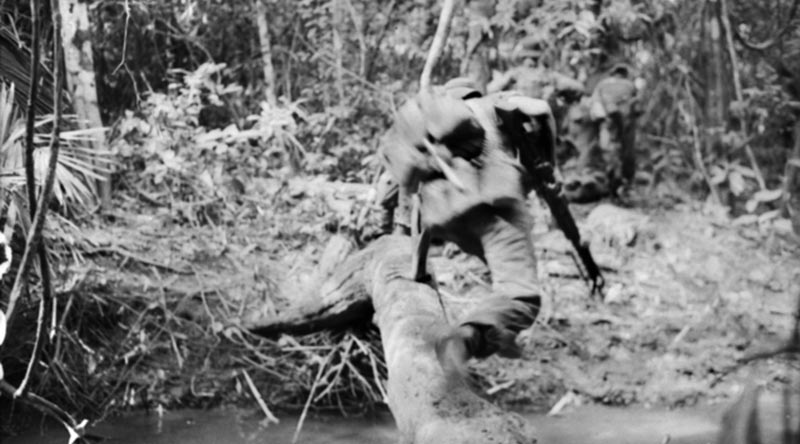 One of thousands of photos taken by Billy Cunneen in Vietnam – a 6RAR soldier dives for cover as firing breaks out during Operation Ingham.
