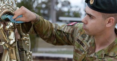 Corporal David-Jose Pelaez, a section commander from the School of Infantry, cleans the Skippy Badge at Depot Company headquarters, Singleton. Story and photo by Private Jacob Joseph.