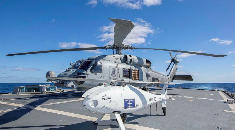 HMAS Ballarat’s embarked MH-60R and S-100 Schiebel Camcopter on the flight deck during Exercise Talisman Sabre. Story by Lieutenant Commander Ryan Zerbe. Photo by Leading Seaman Ernesto Sanchez.