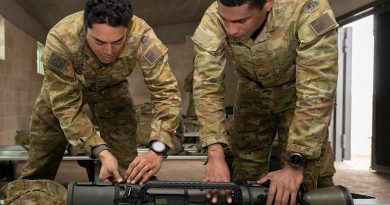 Corporal Steve Tonga, left, and Corporal Paul Tuinanunu, from the 3rd Battalion, Royal Australian Regiment, inspect the Carl Gustaf 84mm Mk4 recoilless rifle after a qualification shoot at the School of Infantry, Singleton. Story and photo by Private Jacob Joseph.