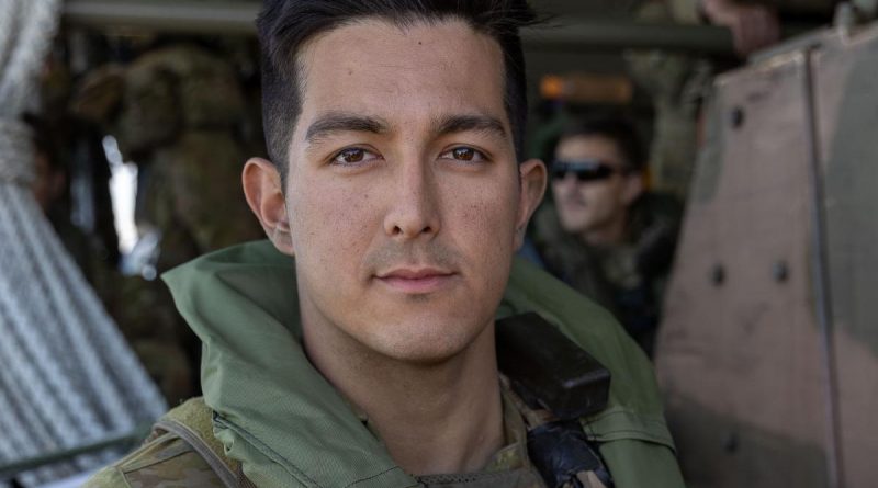 Private Louii Hornibrook, from the 3rd Battalion, Royal Australian Regiment, on board a landing craft during Exercise Talisman Sabre 2021. Story by Captain Dan Mazurek. Photo by Leading Aircraftwoman Jacqueline Forrester.