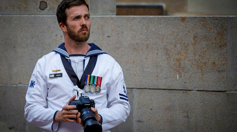 Leading Seaman David Cox captures photographs at the Australian War Memorial in Canberra as part of his Initial Employment Training Course. Story by Petty Officer Helen Frank. Photo by Trooper Jonathan Goedhart.