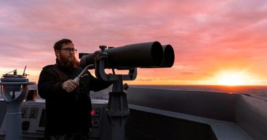 Able Seaman Boatswain’s Mate James Anson keeps watch from the bridge wing as HMAS Brisbane sails off the coast of Queensland during Exercise Talisman Sabre. Story by Lieutenant Sarah Rohweder. Photo by Leading Seaman Daniel Goodman.