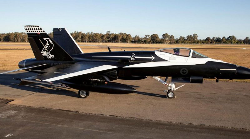 No. 75 Squadron F/A-18A Hornet A21-018 sports a bold black-and-white commemorative livery ahead of the squadron's transition to the F-35A Lightning II in 2022. Story by Flight Sergeant Josa Kohler. Photo by Sergeant Ben Dempster.