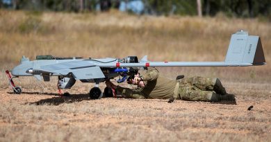 Lieutenant Dallin Stirling attaches post-flight safety tags to a Shadow 200 during Exercise Dragon Sprint at the Townsville Field Training Area. Story and photo by Petty Office Lee-Anne Cooper.