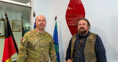 Commander of the 8th/7th Battalion, Royal Victoria Regiment, Lieutenant Colonel Shaun Richards shows Wathaurong man Barry Gilson the Wathaurong Glass shield at the battalion’s headquarters. Story by Captain Kristen Daisy Cleland. Photo by Private Michael Currie.