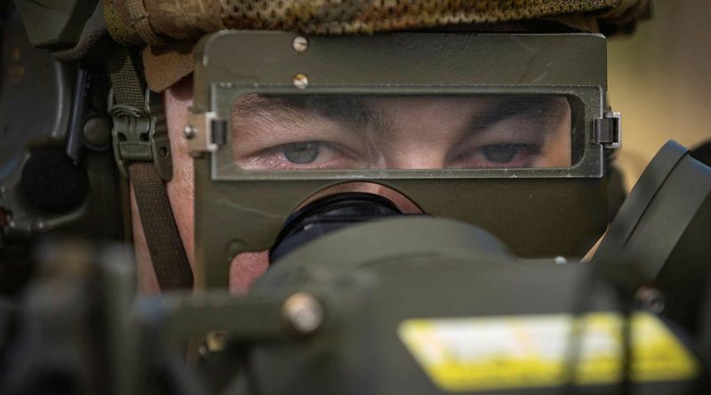 Gunner Nathan Wood, of the 16th Regiment, Royal Australian Artillery, observes a target during the RBS 70 man-portable air defence missile system training serial at the Shoalwater Bay Training Area. Story by Petty Officer Jake Badior. Photo by Corporal Madhur Chitnis.