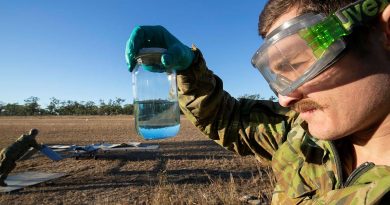 Craftsman Mitchell Toms Camer checks Shadow 200 aviation fuel on the airfield during Exercise Dragon Sprint at the Townsville Field Training Area. Story and photo by Petty Officer Lee-Anne Cooper.