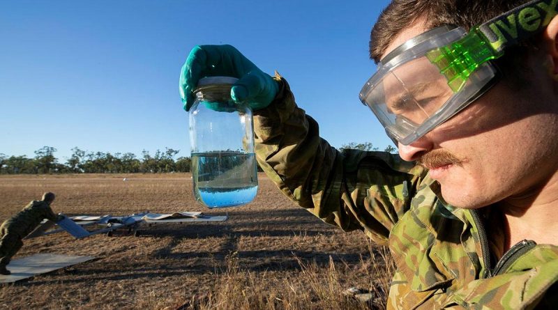 Craftsman Mitchell Toms Camer checks Shadow 200 aviation fuel on the airfield during Exercise Dragon Sprint at the Townsville Field Training Area. Story and photo by Petty Officer Lee-Anne Cooper.