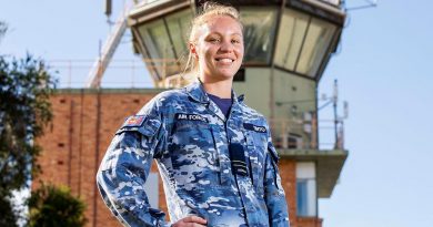 Air traffic controller Flight Lieutenant Amy Tinto, from No. 452 Squadron, in front of the air traffic control tower at RAAF Base Townsville during Exercise Talisman Sabre 2021. Story by Flight Lieutenant Chloe Stevenson. Photo by Leading Aircraftwoman Emma Schwenke.