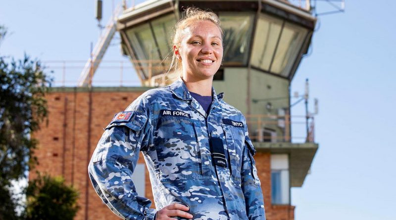 Air traffic controller Flight Lieutenant Amy Tinto, from No. 452 Squadron, in front of the air traffic control tower at RAAF Base Townsville during Exercise Talisman Sabre 2021. Story by Flight Lieutenant Chloe Stevenson. Photo by Leading Aircraftwoman Emma Schwenke.