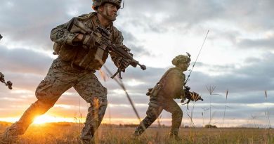 US Marines from 1st Battalion, 7th Marines, moves forward during an assault on Bowen Airport in Queensland on Exercise Talisman Sabre. Story by 1st Lt. Jon Carkhuff (US). Photo by Leading Aircraftwoman Jacqueline Forrester.