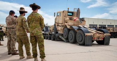 Soldiers from the US Army's 14th Sustainment Brigade demonstrate their vehicle-recovery capabilities to soldiers from the Australian, British and Canadian armies during the Joint Warfighting Assessment. Story by Captain Taylor Lynch. Photo by Corporal Nicole Dorrett.