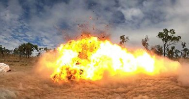 Setting off the charge, a wooden pallet explodes during demolition training on Exercise Phoenix Strike, held in Townsville, Queensland. Story by Captain Lily Charles. Photo by Corporal Brodie Cross.