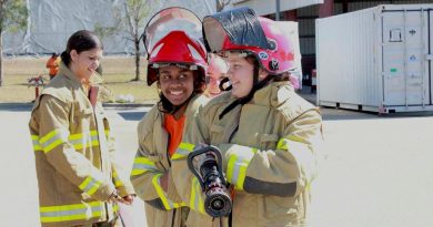 Khalia, Anne and Brieanna, from Stars Foundation, participate in a mock firefighting drill with 9 Petroleum Platoon, Lavarack Barracks as part of a Defence Work Experience Day. Story by Captain Annie Richardson. Photo by Corporal Ashely Hetherington.