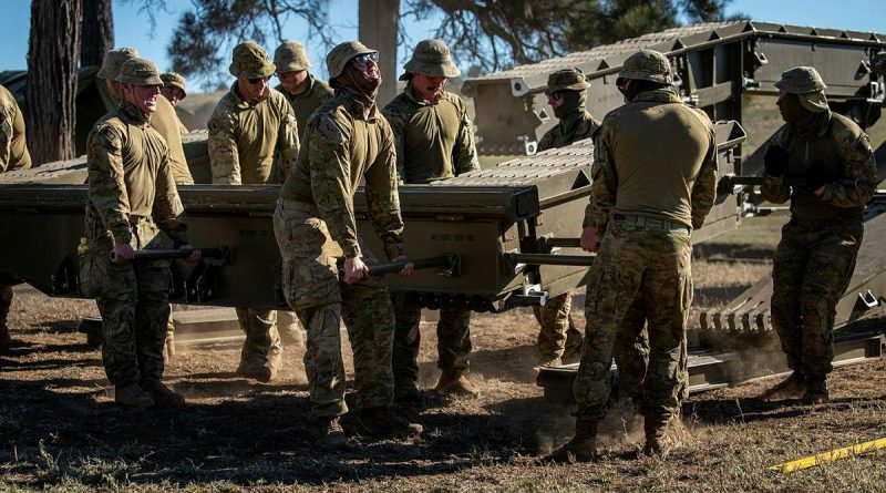 Soldiers from the 2nd Combat Engineer Regiment disassemble a medium girder bridge at Gayndah, Queensland. Story by Captain Taylor Lynch. Photo by Private Jacob Hilton.