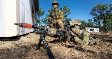 An Australian Army soldier from Battlegroup Coral and a United States Army paratrooper provide security during clearance of an enemy position. Story by Captain Diana Jennings. Photo by Corporal Brandon Grey.