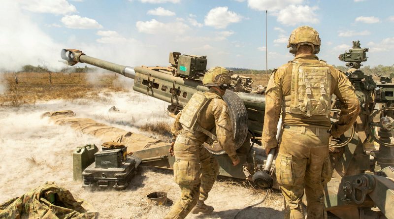 Gunners from the 101st Battery, 8th/12th Regiment, Royal Australian Artillery, fire an M777A2 Howitzer at Mount Bundey Training Area, Northern Territory, as part of an Australia-wide gun salute to mark the 150th anniversary of Australian artillery on August 1. Photo by Corporal Rodrigo Villablanca.