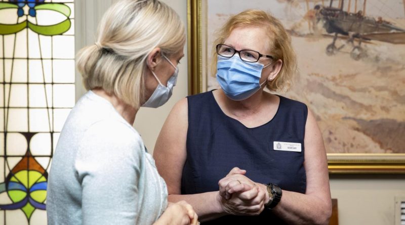 The secretary of Australian Defence Force Nurses Association, Robyn Green, right, talks to an Australian Defence nurse during the luncheon in Brisbane. Story by Flying Officer Robert Hodgson.