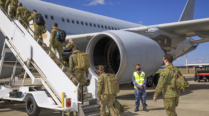 A contingent of Royal Australian Air Force and Australian Army personnel board a KC-30A multi-role tanker transport at RAAF Base Amberley bound for the Middle East to support evacuation efforts from Afghanistan. Photo by Corporal Brett Sherriff.