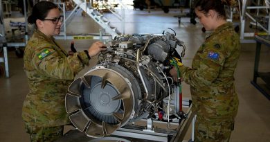 Corporal Shayna Antonio, left, and Sergeant Phillipa Finlay conduct an inspection on an MRH-90 Taipan engine at the Army Aviation Training Centre, Oakey, Queensland. Story by Captain Carolyn Barnett. Photo by Mary McKenzie.