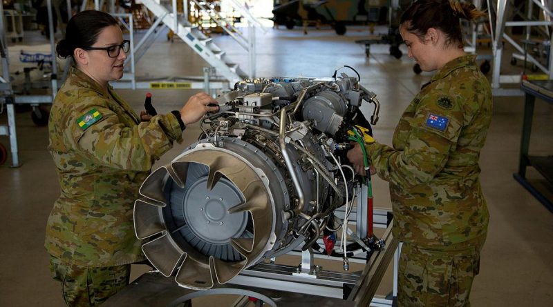 Corporal Shayna Antonio, left, and Sergeant Phillipa Finlay conduct an inspection on an MRH-90 Taipan engine at the Army Aviation Training Centre, Oakey, Queensland. Story by Captain Carolyn Barnett. Photo by Mary McKenzie.