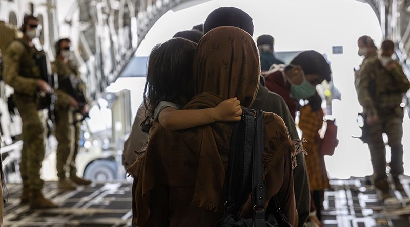 Afghanistan evacuees arrive at Australia’s main operating base in the Middle East, on board a Royal Australian Air Force C-17A Globemaster. Photo by Leading Aircraftwoman Jacqueline Forrester.