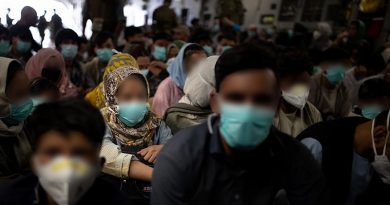 Afghan families are packed into a Royal Australian Air Force C-17A Globemaster III for evacuation from Hamid Karzai International Airport in Kabul, Afghanistan. Photo by Sergeant Glen McCarthy.