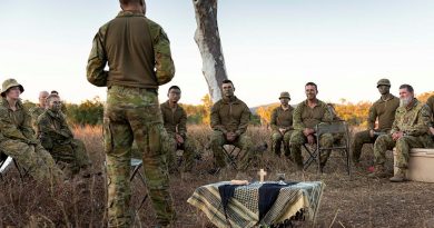 Chaplain Gary Pope, of the 3rd Brigade Headquarters, delivers a field service to soldiers during Exercise Talisman Sabre at Townsville Field Training Area, Queensland. Story by Captain Diana Jennings. Photo by Corporal Brendon Grey.