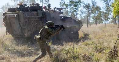 Private Harry Price from the 1st Battalion, Royal Australian Regiment, and mounted soldiers from the 2nd Cavalry Regiment engage an enemy position during Exercise Eagle Run at the Townsville Field Training Area. Story by Captain Lily Charles. Photo by Corporal Brodie Cross.