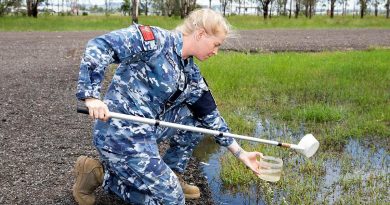 Air Force environmental health officer, Flying Officer Jamie Clifford from No 1 Expeditionary Health Squadron, looks for mosquito larva in samples of water during Exercise Regimen White 21 at RAAF Base Amberley. Story by Flying Officer Robert Hodgson. Photo by Leading Aircraftwoman Emma Schwenke.