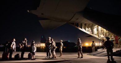 Evacuees board the first Australian rescue flight out of Kabul, Afghanistan. Photo by Sergeant Glen McCarthy.