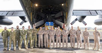 The first of 250 New Zealand Defence Force personnel to deploy to the Middle East to join evacuation efforts from Kabul pose for a photo before departing RNZAF Base Auckland. NZDF photo.