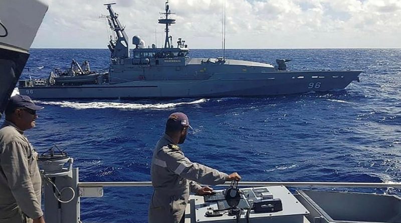 HMAS Glenelg sails in company with RFNS Savenaca between Fiji and Vanuatu as part of Operation Island Chief. Story by Lieutenant Sarah Rohweder. Photo by Republic of Fiji Navy.