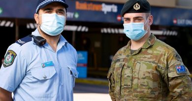 NSW Police and Private Jordan Sayers work together to patrol the Bankstown sports centre in support of the NSW Operation Covid-19 Assist. Story by Lieutenant Commander John Thompson. Photo by Corporal Dustin Anderson.