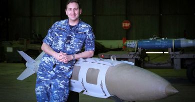 Defence Explosive Ordnance Training School instructor Flight Lieutenant Ben Lindsay with a teaching aid, a 2000-pound joint direct attack munition. Story by Flight Lieutenant Julia Ravell.