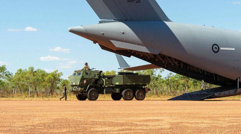 A United States Marine Corps High Mobility Artillery Rocket System is offloaded from a Royal Australian Air Force Boeing C-17 Globemaster III as part of Exercise Loobye. Story by Lieutenant Gordon Carr-Gregg. Photo by Captain Carla Armenti.
