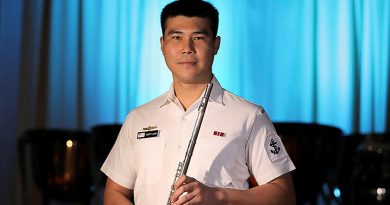 Leading Seaman Henry Liang with his flute. Story by Leading Seaman Jonathan Rendell. Photo by Petty Officer Nina Fogliani.