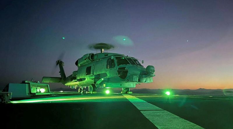 HMAS Parramatta's embarked MH-60R prepares to launch from the flight deck during Exercise Talisman Sabre. Story by Lieutenant Sarah Rohweder.