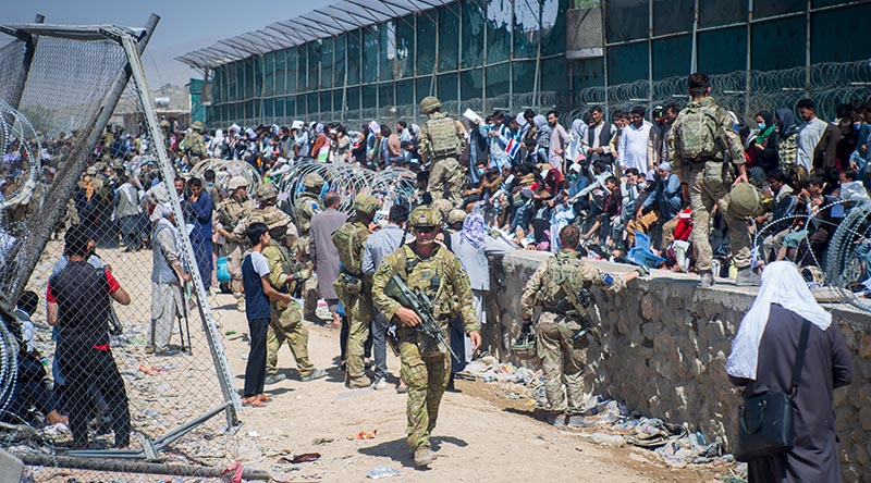 Airport passport control, Kabul style –  members of the 1st Battalion, Royal Australian Regiment, at Abbey Gate, Hamid Karzai International Airport. Photo by Sergeant Glen McCarthy.