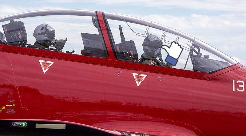 Assistant Minister for Defence Andrew Hastie (rear) and No 2 Flight Training Squadron instructor Squadron Leader Shannon McGuckin give the thumbs up before a flight in a PC-21 at RAAF Base Pearce. Photo by Petty Officer Yuri Ramsey.