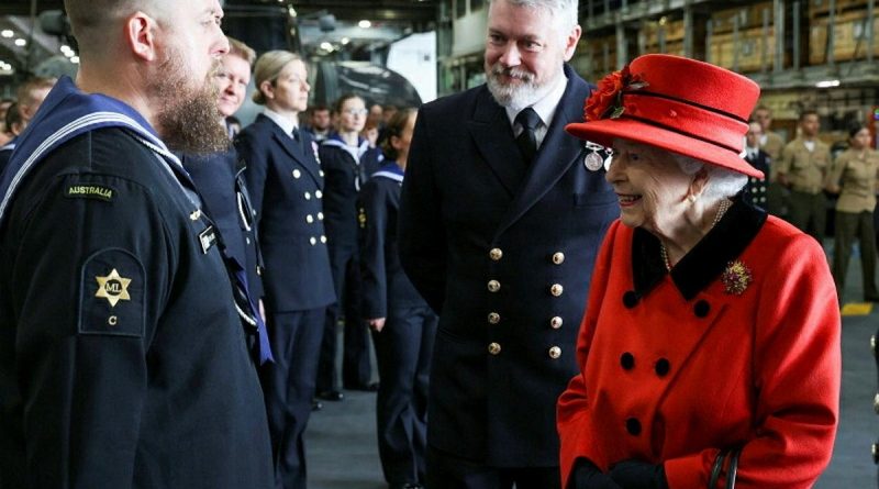 Leading Seaman Matt Jones, left, meets Her Majesty the Queen on board the Royal Navy’s flagship carrier, HMS Queen Elizabeth, as she farewells Carrier Strike Group 21 ahead of its Indo-Pacific deployment. Story by Lieutenant John Paul. Photo by Petty Officer Jay Allen.