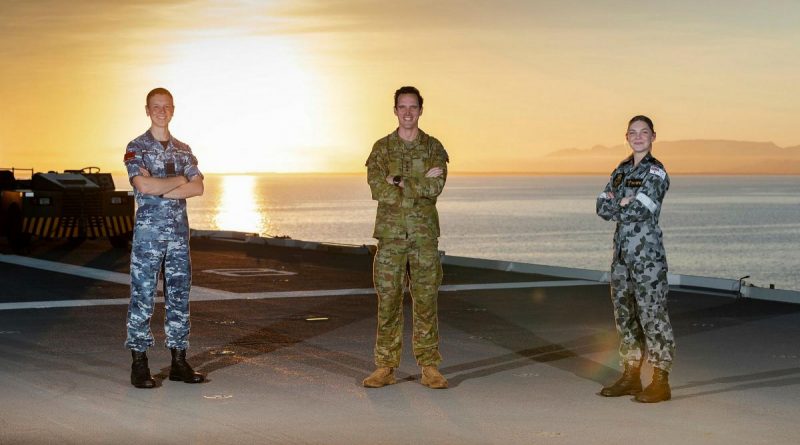 Army Captain Samuel O’Neal, centre, RAAF Flying Officer Kristian Henderson and RAN Leading Seaman Medic Erika Birkefeld on board HMAS Canberra during Exercise Talisman Sabre 2021. Photo by Leading Seaman Sittichai Sakonpoonpol.