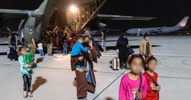 Evacuees from Afghanistan disembark a Royal Air Force C-130 Hercules at Australia’s main operating base in the Middle East. Leading Aircraftwoman Jacqueline Forrester.