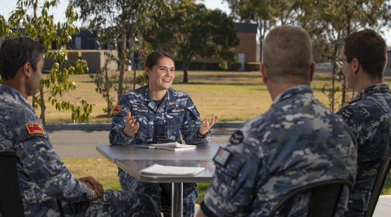 Flying Officer Maddison Brassil shares experiences with colleagues at RAAF Base Amberley, as part of the mentoring program. Story by Erin Fomin. Photo by Corporal Jesse Kane.